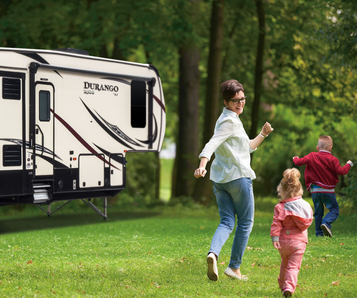 2018 Durango 2500 Full Profile Luxury Fifth Wheel with Family Playing Outside