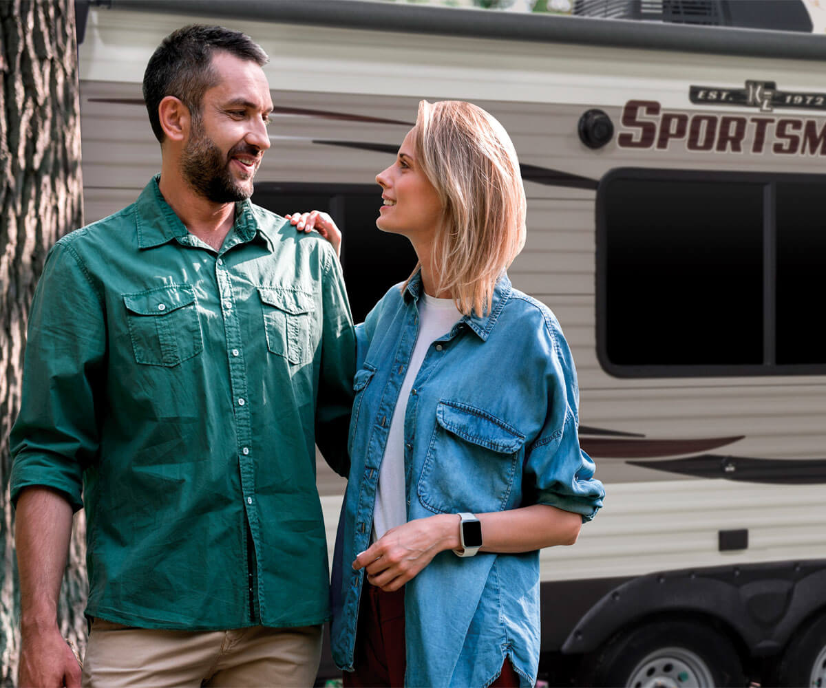 2018 Sportsmen LE Travel Trailer with Couple Camping