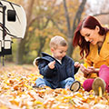 2018 KZ RV Sportsmen 231RK Fifth Wheel with Mother and Son Exploring Fall Leaves
