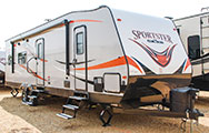 2018 KZ RV Sportster 301THR Travel Trailer Toy Hauler Exterior Front 3-4 Door Side