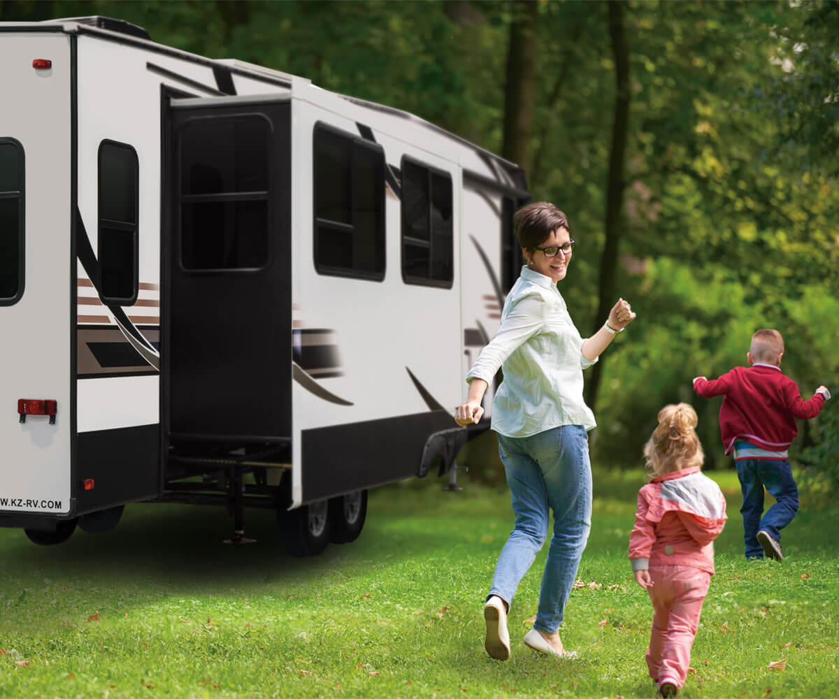 2019 Durango Full-Profile Luxury Fifth Wheel with Family Playing Outdoors