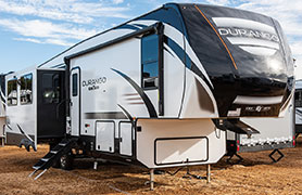 2019 KZ RV Durango D325RLT Fifth Wheel Exterior Front 3-4 Door Side with Slide Out
