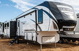 2019 KZ RV Durango D343MBQ Fifth Wheel Exterior Front 3-4 Door Side with Slide Out