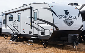2019 KZ RV Sportster 301THR Travel Trailer Toy Hauler Exterior Front 3-4 Door Side