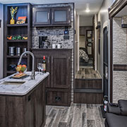 2019 KZ RV Sportster 343TH11 Fifth Wheel Toy Hauler Kitchen with Blue Lights On