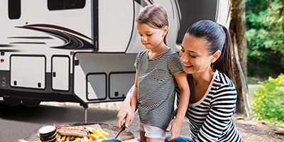 2019 KZ RV Durango Gold G356RLT Fifth Wheel with Mother and Daughter Preparing Food