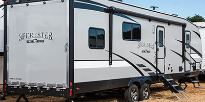 2019 KZ RV Sportster 301THR Travel Trailer Toy Hauler Exterior Rear 3-4 Door Side