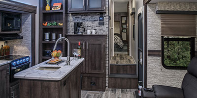 2019 KZ RV Sportster 343TH11 Fifth Wheel Toy Hauler Kitchen with Blue Lights On