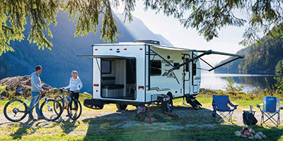 2021 KZ RV Escape E17 HATCH Travel Trailer Exterior with Couple Mountain Biking
