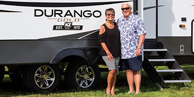 2022 KZ RV Durango Gold G358RPQ Fifth Wheel with Couple by Entrance
