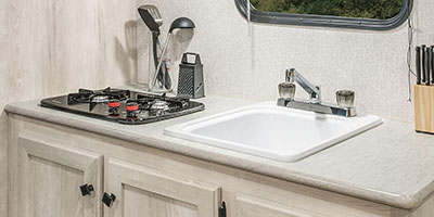 2022 KZ RV Sportsmen Classic 160QB Travel Trailer Kitchen Cabinets