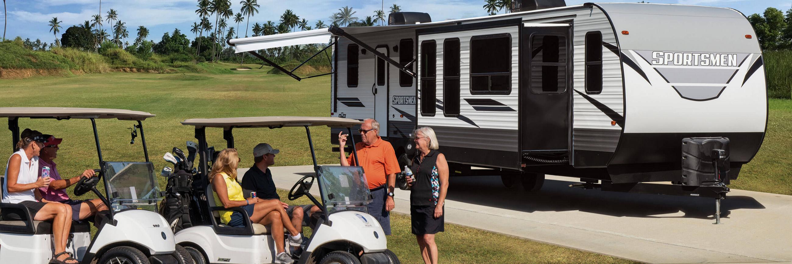 2022 KZ RV Sportsmen 364BH Destination Travel Trailer with Golfers at Golf Course