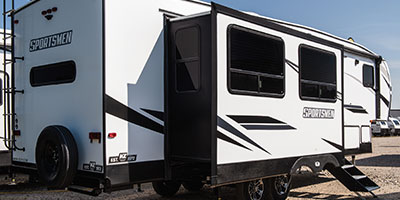 2023 KZ RV Sportsmen 303MB Fifth Wheel Exterior Rear 3-4 Door Side with Slide Out