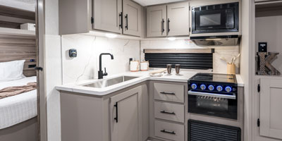 2025 KZ RV Connect SE C221RBSE Travel Trailer Kitchen Sink, Oven, Cooktop, Microwave and Cabinets