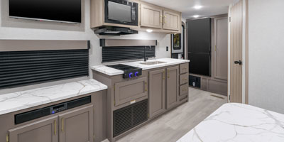 2025 KZ RV Sportsmen Select 221RKSL Travel Trailer Kitchen, Microwave, Storage, TV, Stove and Refrigerator