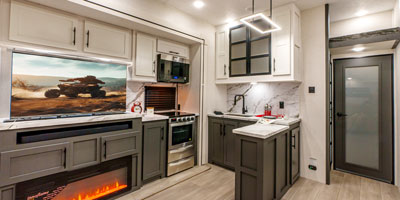 2025 KZ RV Sportster X 3914X Fifth Wheel Toy Hauler Kitchen and TV