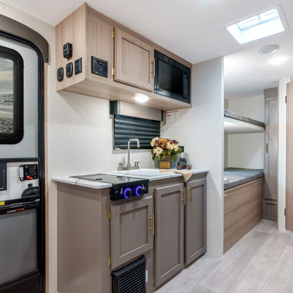2025 KZ RV Sportsmen Classic 191BHK Travel Trailer Kitchen 2 Burner Flush Mounted Cooktop
