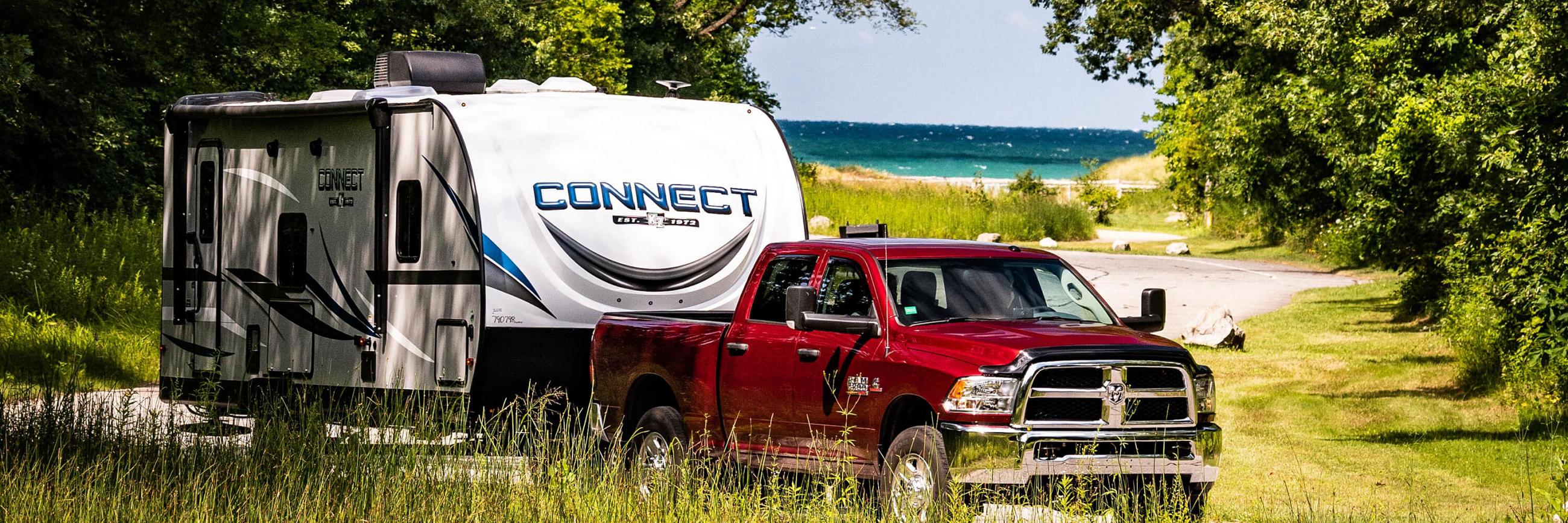 2020 KZ RV Connect Travel Trailer being Towed to Campsite