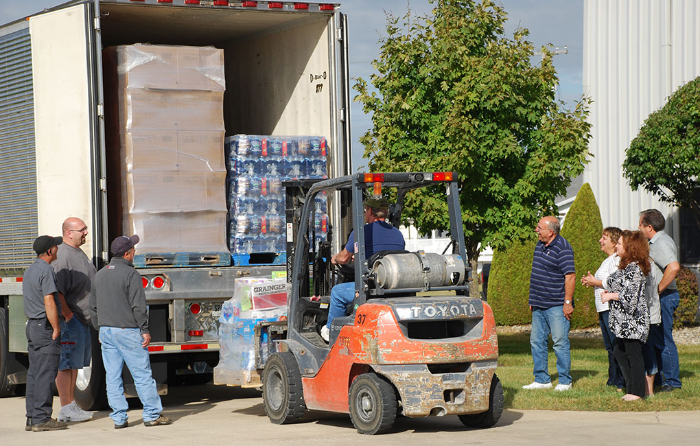 loading hurricane relief supplies in semi trailer