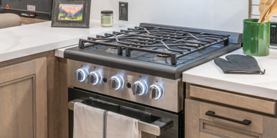 2026 KZ RV Durango Gold G393MKF Fifth Wheel Kitchen Cooktop, Oven and Microwave Detail