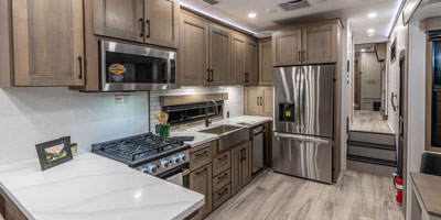 2026 KZ RV Durango Gold G393MKF Fifth Wheel Kitchen Countertops, Fridge, Microwave, Oven and Cabinets