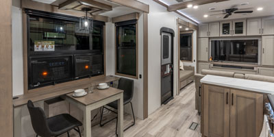 2026 KZ RV Durango Gold G393MKF Fifth Wheel Sliding Table and Chairs Slide