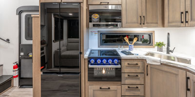 2026 KZ RV Durango HT D296BHT Fifth Wheel Kitchen Refrigerator, Microwave, Cooktop, Oven and Sink