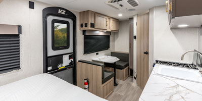 2026 KZ RV Sportsmen Classic 130RD Travel Trailer Dinette and Living Room