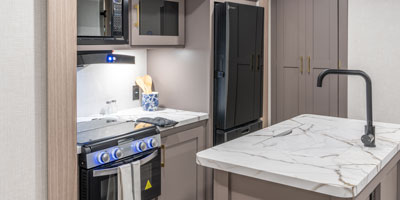 2026 KZ RV Sportsmen SE 344BHKSE Travel Trailer Kitchen Microwave, Oven and Island